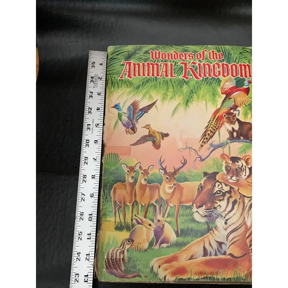 1959 Wonders of the Animal Kingdom Stamp Album Howard Winter Golden Glow AS IS